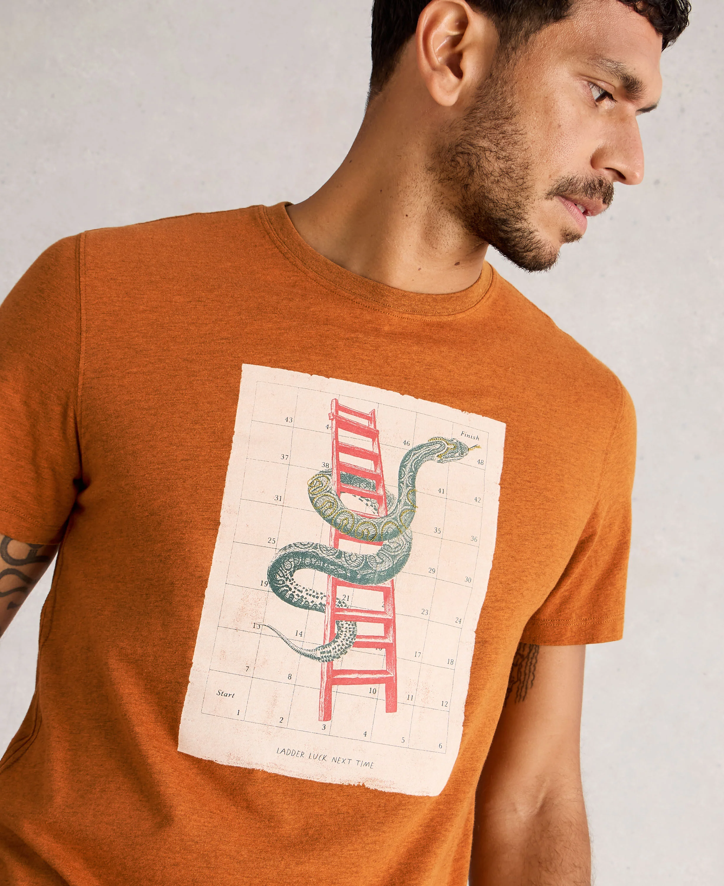 Abersoch Graphic Boardgame Tee - Orange Print - Image 4